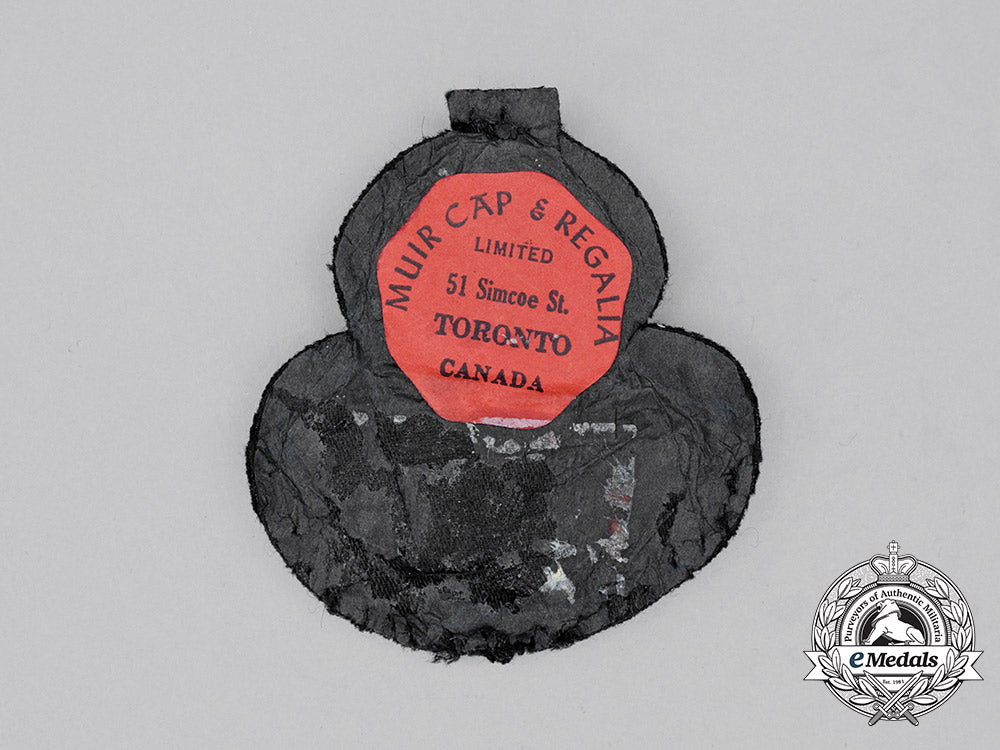 a_second_war_royal_canadian_air_force(_rcaf)_officer's_cap_badge_cc_1566