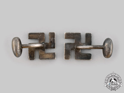 united_kingdom._a_set_of_silver_swastika_cufflinks_by_joseph_gloster_ci19_3412_2_1_1