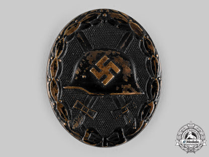 germany,_wehrmacht._a_wound_badge,_black_grade,_with_award_document_to_fritz_mengel_ci19_6107