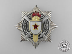 A Socialist Yugoslavian Order Of Military Merit; 3rd Class With Silver Swords