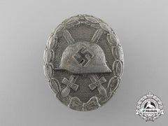 A Silver Grade Wound Badge By Carl Wild