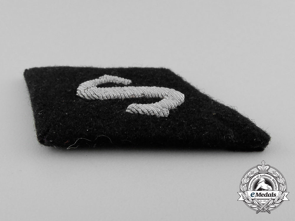 germany._a_waffen-_ss_quartermaster_sergeant_sleeve_diamond,_removed_from_salesman’s_board_d_7654_1