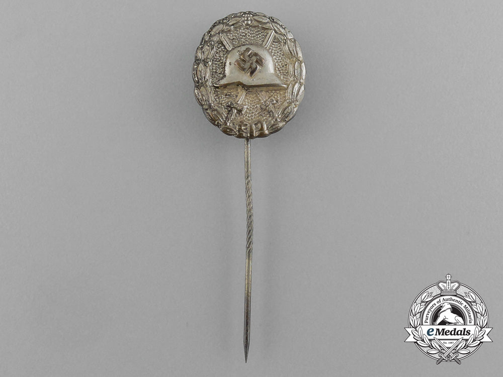 a_miniature_legion_condor_wound_badge_stick_pin_on_its_original_ldo_salesman’s_board_e_1664