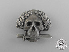 An Second War Italian Black Brigade Skull Badge