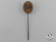 A Miniature West Wall Medal Stick Pin