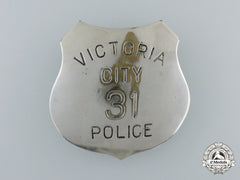 A Victoria City Police Badge # 31