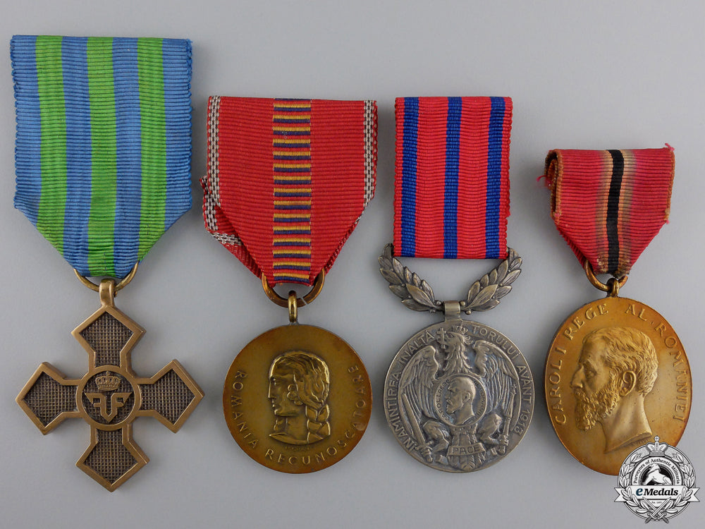romania,_kingdom._a_lot_of_four_medals_and_awards_four_romanian_me_5536ab2734136