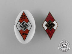 A Grouping Of Two Hj Badges