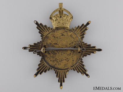 a190877_th_canadian_infantry_helmet_plate;_king's_crown_img_02.jpg53dce46143884