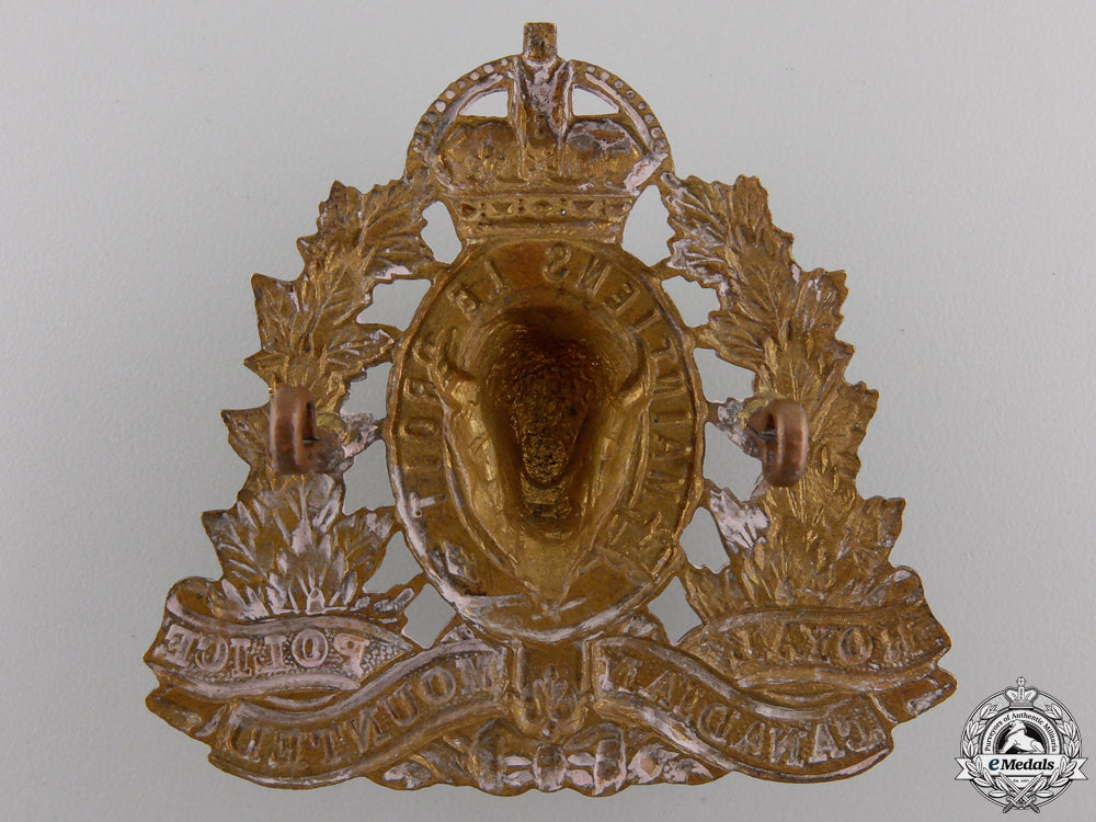 canada._a_royal_canadian_mounted_police_cap_badge,_c.1945_img_02.jpg554a31293398b