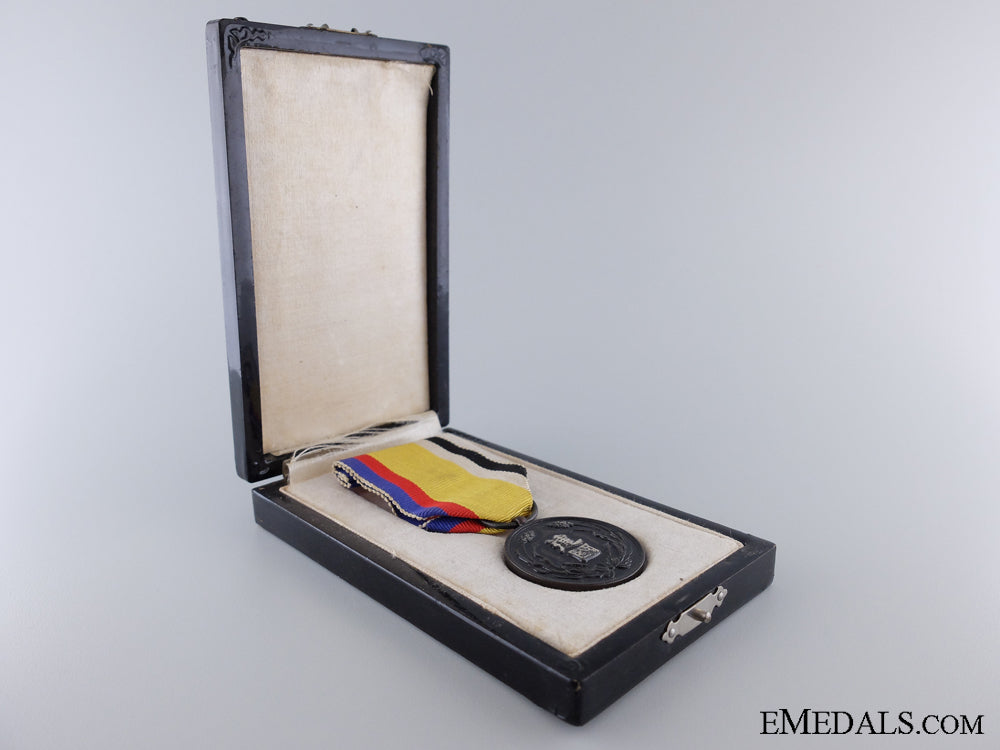 a_manchukuo_national_foundation_merit_medal_img_03.jpg53b5707f4691c