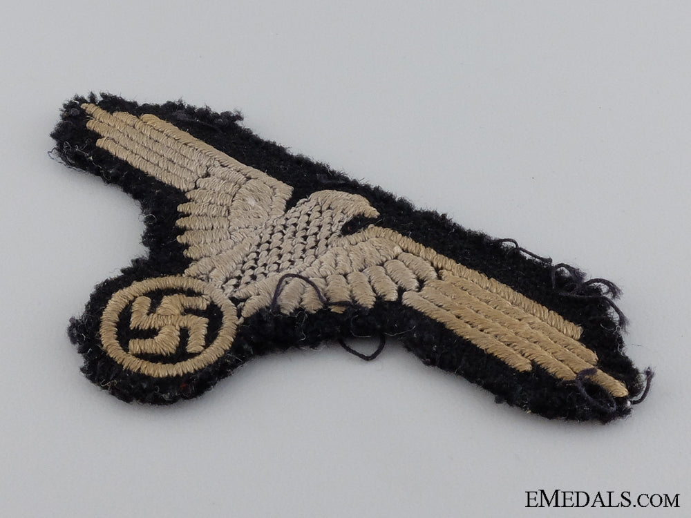 a_uniform_removed_waffen-_ss_sleeve_eagle_img_03.jpg546a5350630d7