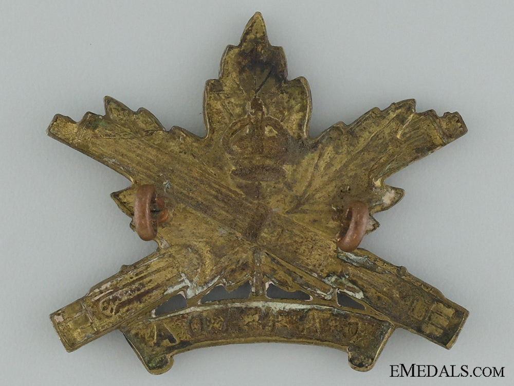 wwi_machine_gun_corps_cap_badge;_canadian_issue;4_th_version_img_36.jpg53752b92108ab