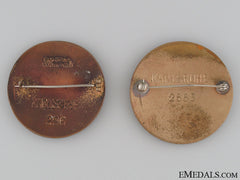 Two Red Cross Badges