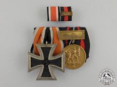 An Iron Cross 1939 Second Class & Sudetenland Medal Pair With Ribbon Bar