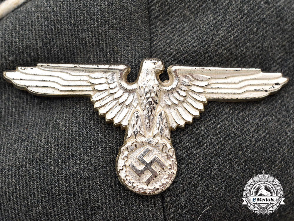 germany,_ss._a_rare_waffen-_ss_officer’s_visor_cap,_by_albert_lammerer_l22_mnc1054_793