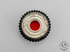 Germany. A Third Reich Period Metal Tri-Colour Cap Cockade