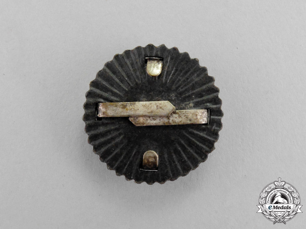 germany._a_third_reich_period_metal_tri-_colour_cap_cockade_m17-351