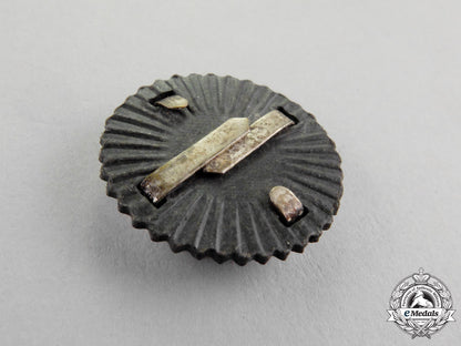 germany._a_third_reich_period_metal_tri-_colour_cap_cockade_m17-352