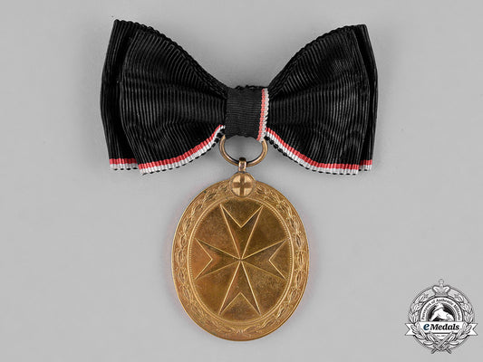 austria,_empire._an_order_of_the_knights_of_malta_gold_merit_medal,_c.1918,_with_wd_ribbon_m18_9887