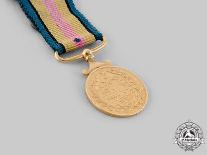 turkey,_ottoman_empire._a_medal_of_sishaneli_tufek_in_gold,_miniature,_c.1870_m19_23367