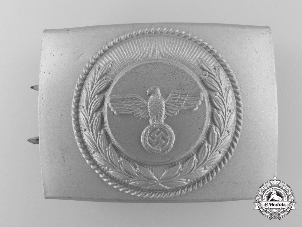 an_unidentified_steel_buckle;_published_example_m_247