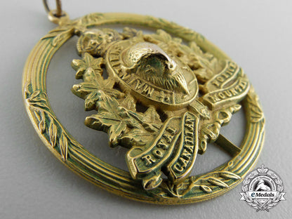 a_royal_canadian_mounted_police_sweetheart_pendant_in_gold_o_846