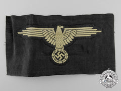 A Waffen-Ss Tropical Sleeve Eagle With Rzm-Ss Label