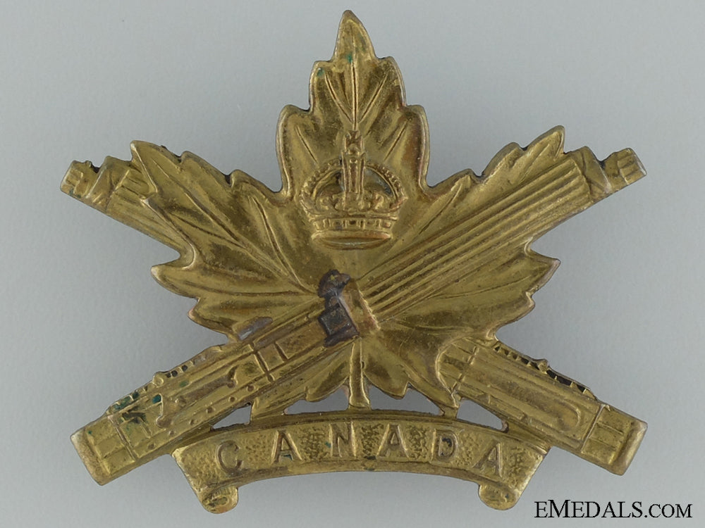 wwi_machine_gun_corps_cap_badge;_canadian_issue;4_th_version_wwi_machine_gun__53752b749d875