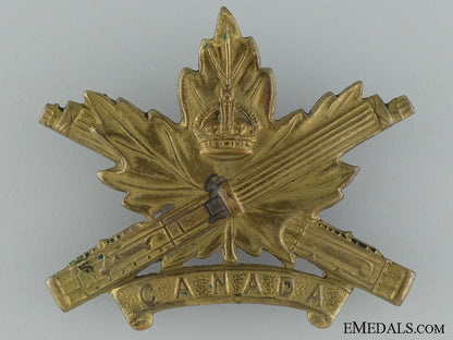 wwi_machine_gun_corps_cap_badge;_canadian_issue;4_th_version_wwi_machine_gun__53752b749d875