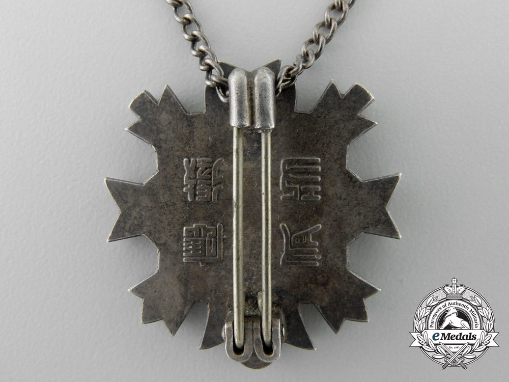 a_second_war_japanese_bereaved_family_association_badge:_combat_version_z_512