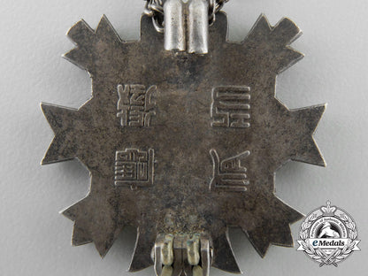 a_second_war_japanese_bereaved_family_association_badge:_combat_version_z_513