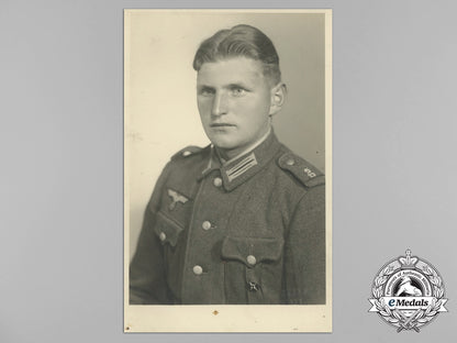 germany._a_wartime_studio_photo_of_an_wehrmacht_em_with_hj_shooting_badge_zz_1704_1__3_1